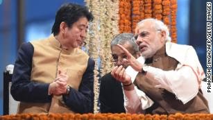 Shinzo Abe meets Indian Prime Minister Narendra Modi on the banks of the River Ganges at Varanasi in December 2015.