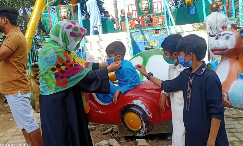 Citizens wear face masks in Abbottabad. — Photo courtesy Abbottabad DC Office