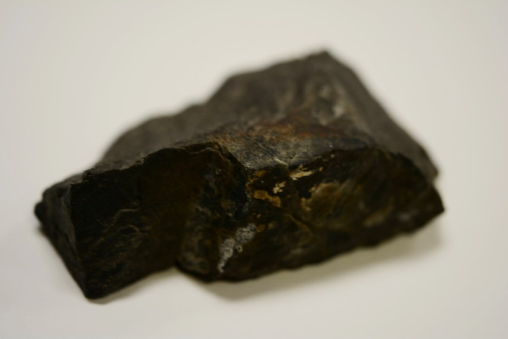 Rock taken from the Abruzzi Ridge. Karakoram translates to, black gravel.  Robert H. Bates Collection