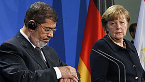 morsi-merkel-300-rtr3d5h2.jpg