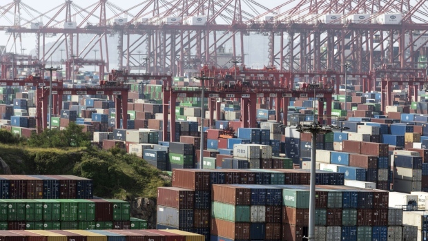 gantry-cranes-and-containers-at-the-yangshan-deepwater-port-in-shanghai-china-on-tuesday-july-5-2022-senior-us-and-chinese-officials-discussed-us-economic-sanctions-and-tariffs-tuesday-amid-reports-the-biden-administration-is-close-to-rolling-back-some-of-the-trade-levies-imposed-by-former-president-donald-trump-photographer-qilai-shen-bloomberg.jpg