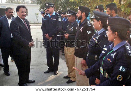 stock-photo-islamabad-pakistan-dec-federal-minister-for-interior-a-rehman-malik-talks-with-police-67251964.jpg