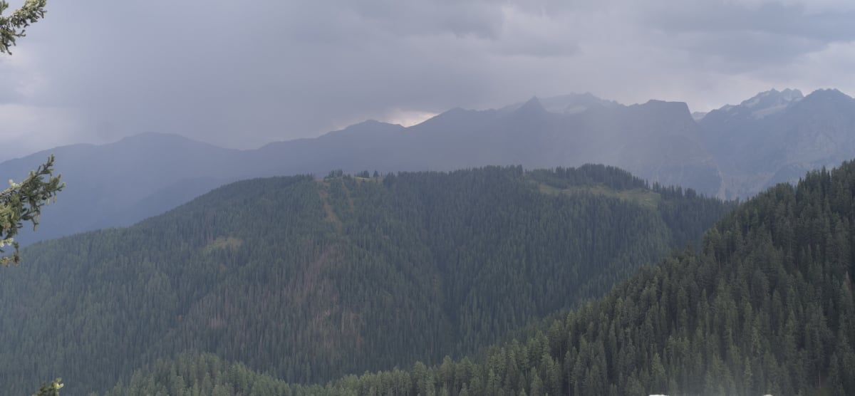 Heavy clouds while descending from Badawi top to Kalam — not a good sign on a dirt trek.