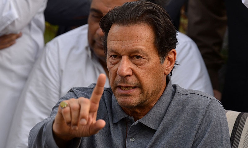PTI chairman Imran Khan gestures during a press conference on Saturday. — AFP