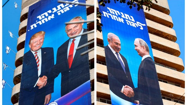 Compilation of photos showing two Likud election banners showing Netanyahu shaking hands with Trump and with Putin, Tel Aviv, July 28, 2019.