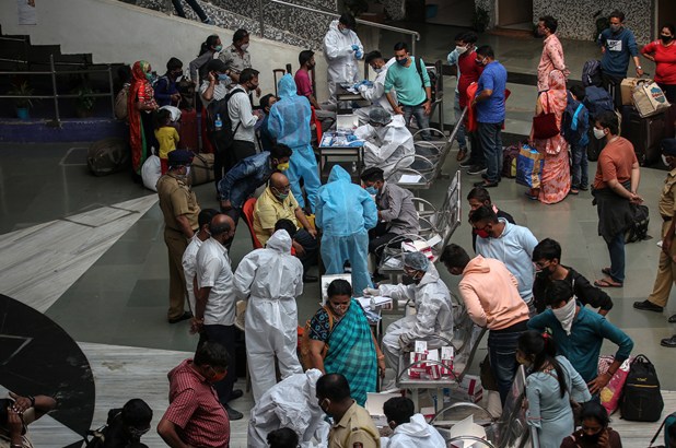 Indian medical personnel collect swab samples for a coronavirus COVID-19 Rapid Antigen detection tests