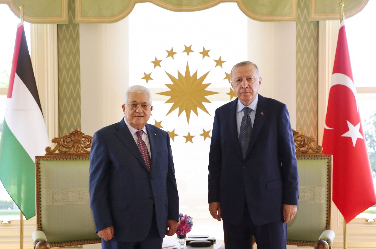 A handout picture taken and released by the Turkish Presidential press office on July 10, 2021 shows Turkish President Recep Tayyip Erdoğan (R) meeting with Palestinian President Mahmoud Abbas (L) in Istanbul. (Turkish Presidency via AFP)