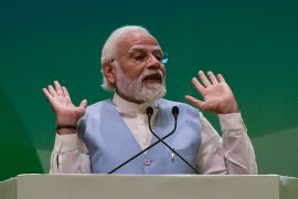 India's Prime Minister Narendra Modi was the chief minister of the western state of Gujarat when it was gripped by communal riots that left more than 1,000 people dead - most of them Muslims [File: Sam Panthaky/AFP]