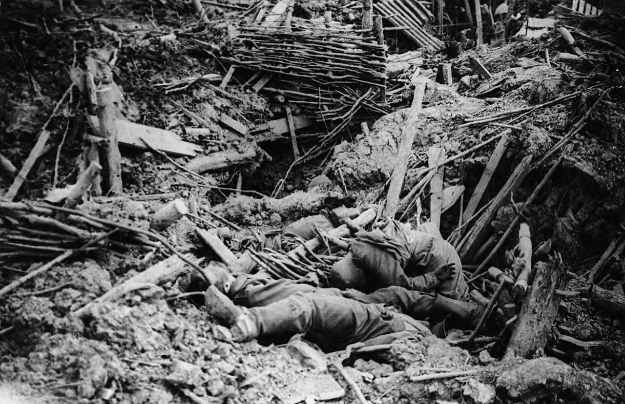 1280px-NLS_Haig_-_Smashed_up_German_trench_on_Messines_Ridge_with_dead.jpg