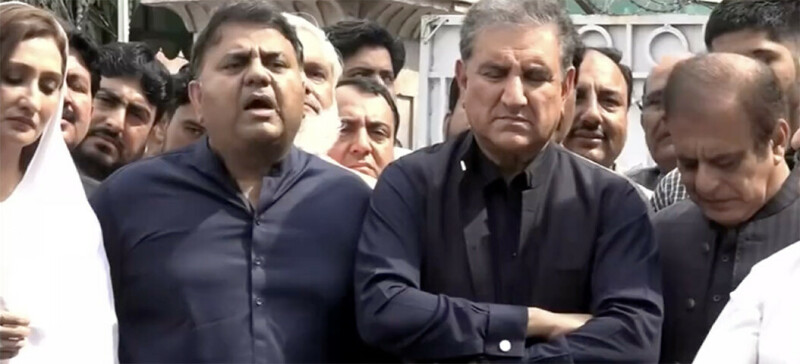 Fawad Chaudhry and Shah Mahmood Qureshi on Sunday.—Screengrab from PTI official