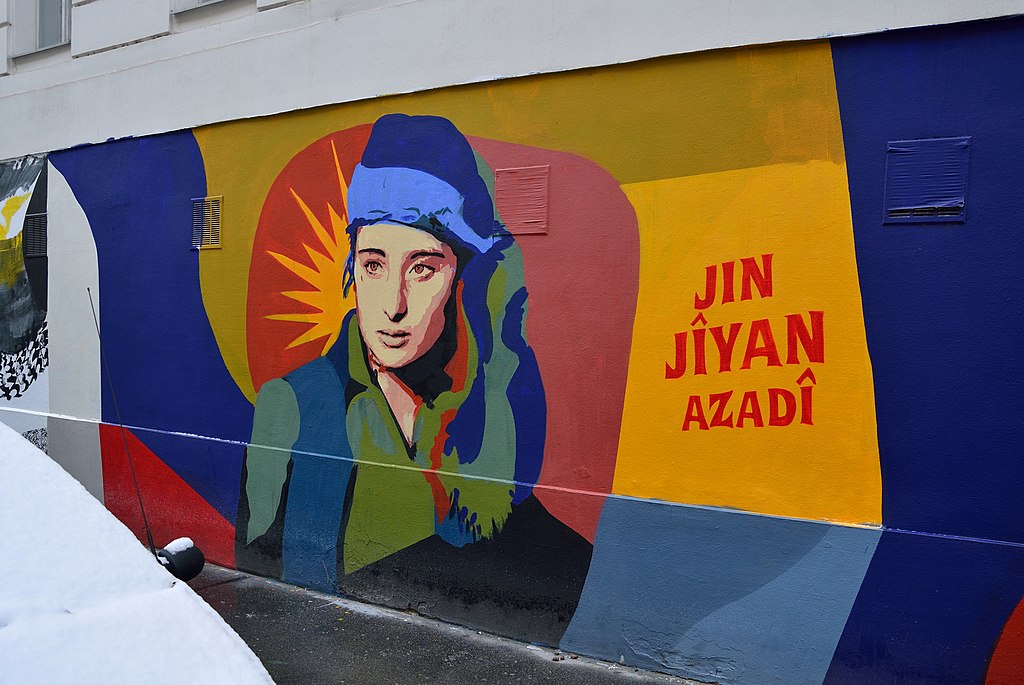 1024px-Jin_Jiyan_Azadi_by_Btoy%2C_Schwendergasse%2C_Vienna.jpg