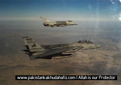 155841_218245093_a-pakistani-f-7p-in-formation-with-an-american-f-14-over-pakistan-very-rare-picture.jpg