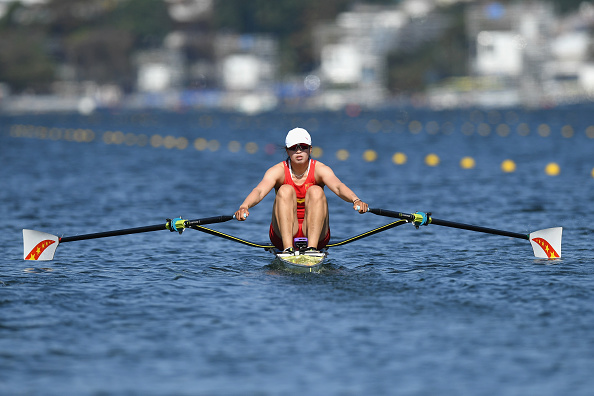 jingli-duan-of-china-competes-during-the-womens-single-sculls-heat-4-picture-id586404258