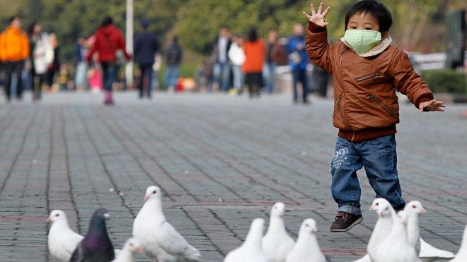 China%20bird%20flu%20child%20face%20mask_Reuters.jpg