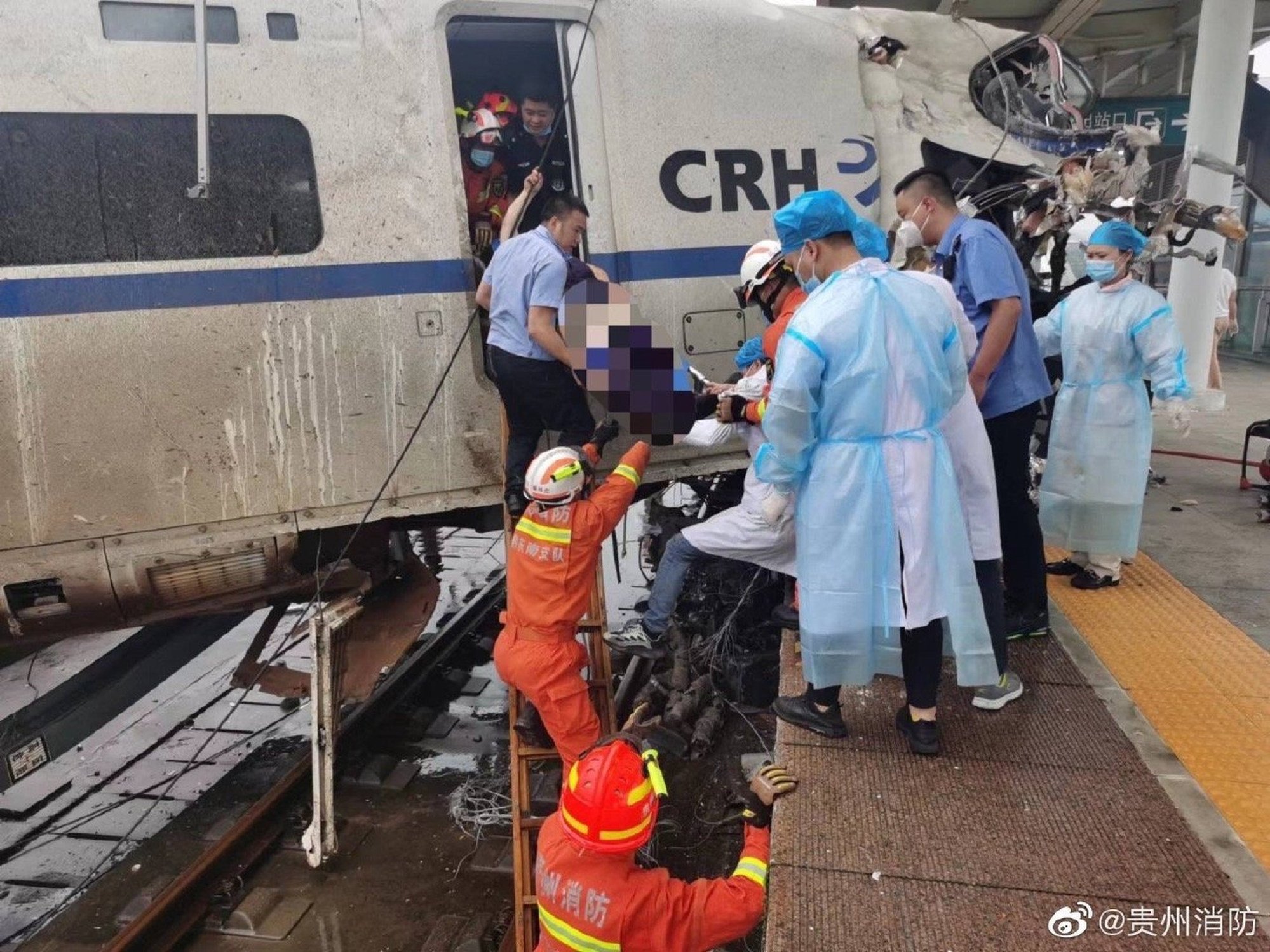 Emergency workers attend the scene at Rongjiang railway station in Guizhou province. Photo: Weibo
