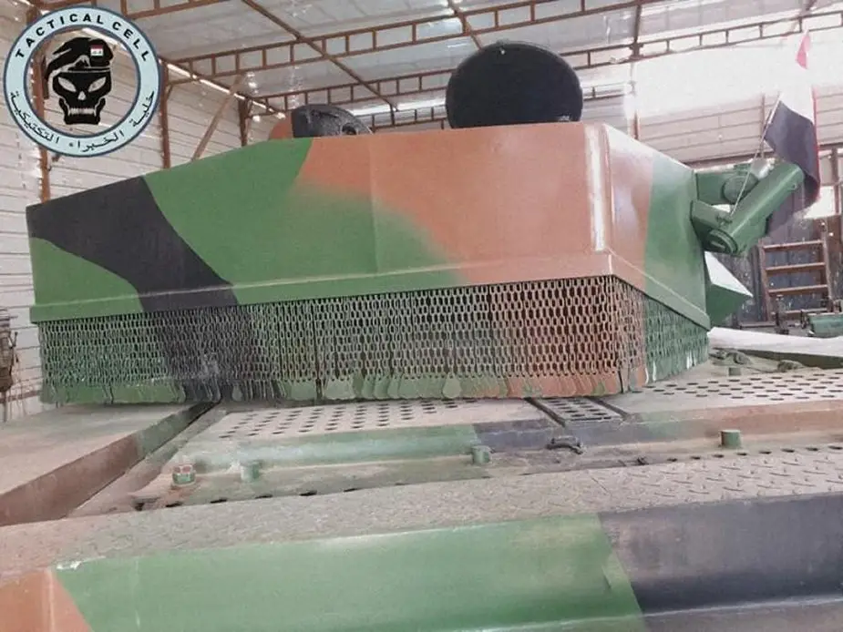 Iraq_unveils_indigenous_T-55_Al-Kafil-1_MBT_main_battle_tank_4.jpg