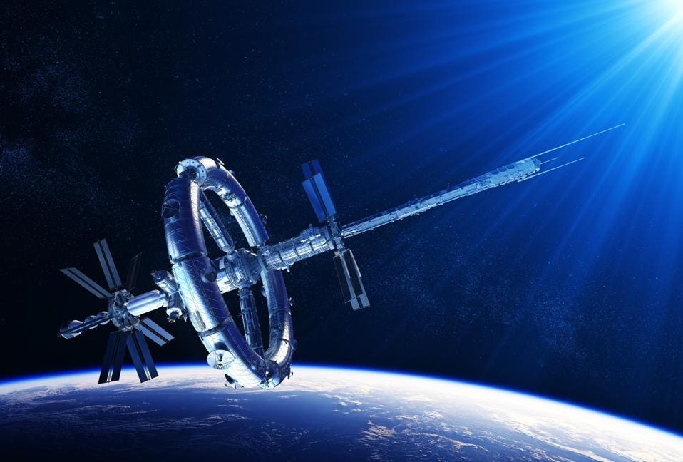 https%3A%2F%2Fspecials-images.forbesimg.com%2Fimageserve%2F6127b2920d67d45e8a181602%2FFuturistic-Space-Station-In-The-Rays-Of-Blue-Light%2F960x0.jpg%3Ffit%3Dscale