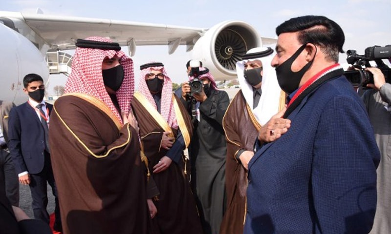 Interior Minister Sheikh Rashid welcomes a Saudi delegation, led by his counterpart, Prince Abdulaziz bin Saud bin Naif, at Nur Khan Airbase in Rawalpindi. — APP