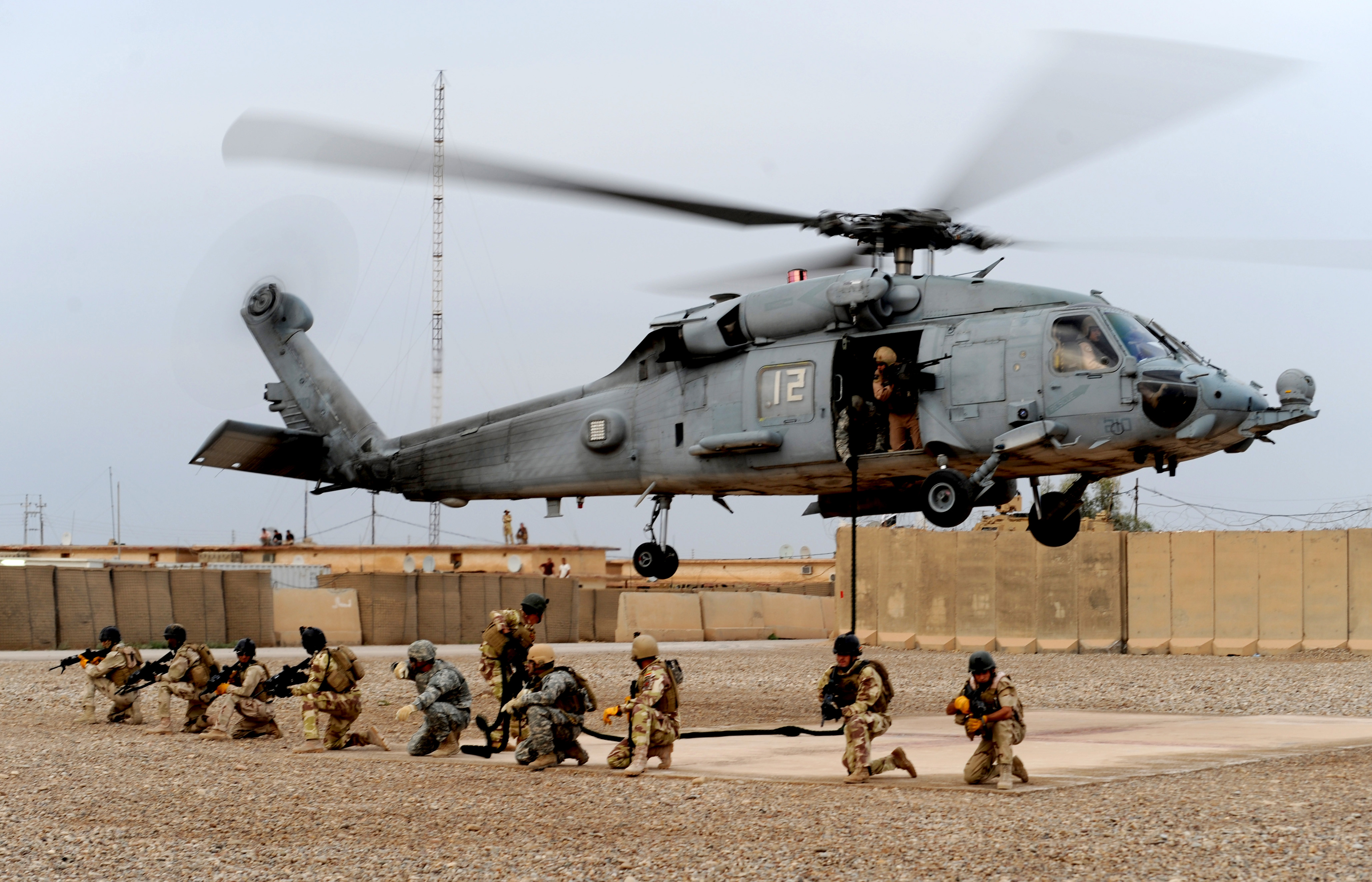 US_Navy_100427-N-0879R-998_Iraqi_Special_Operations_Forces_soldiers_set_a_perimeter_after_fast-roping_insertion_training.jpg
