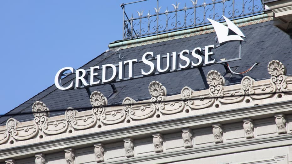 A sign on the roof of the Credit Suisse Group AG headquarters in Zurich, Switzerland, on Thursday, March 16, 2023. Credit Suisse tapped the Swiss National Bank for as much as 50 billion francs ($54 billion) and offered to repurchase debt, seeking to stem a crisis of confidence that has sent shockwaves across the global financial system. Photographer: Francesca Volpi/Bloomberg via Getty Images