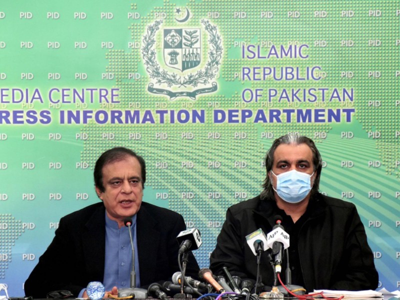 federal minister for information and broadcasting senator shibli faraz along with federal minister for kashmir affairs and gilgit baltistan ali amin gandapur addressing a press conference in islamabad on december 11 2020 photo pid