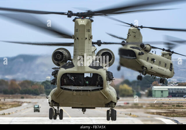two-ch-47f-chinook-helicopters-take-off-boeing-ch-47-chinooks-american-fb7a5x.jpg