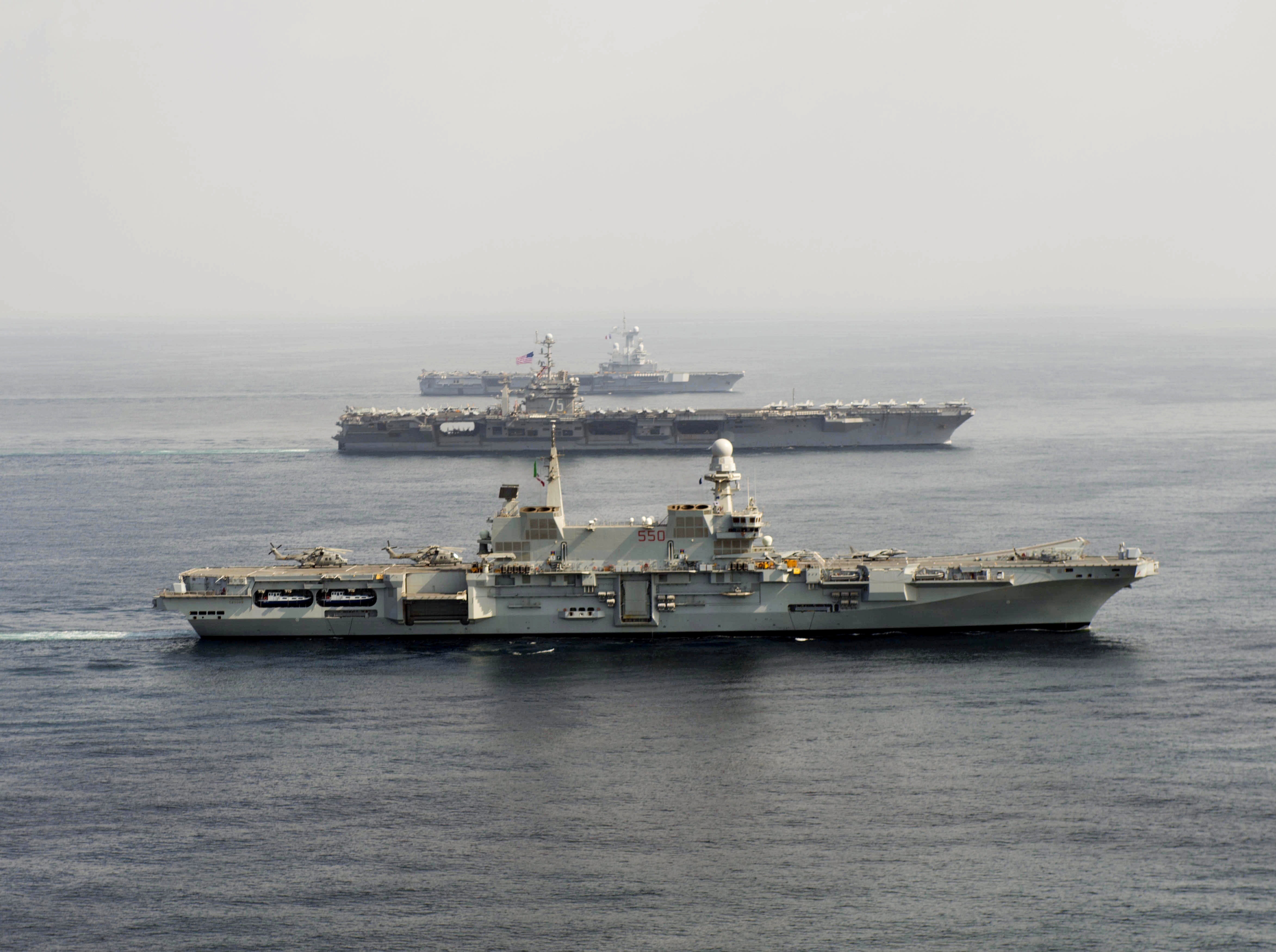 Carriers_Cavour_%28550%29_-_Harry_S._Truman_%28CVN-75%29_and_Charles_de_Gaulle_%28R91%29_underway_in_2013.JPG