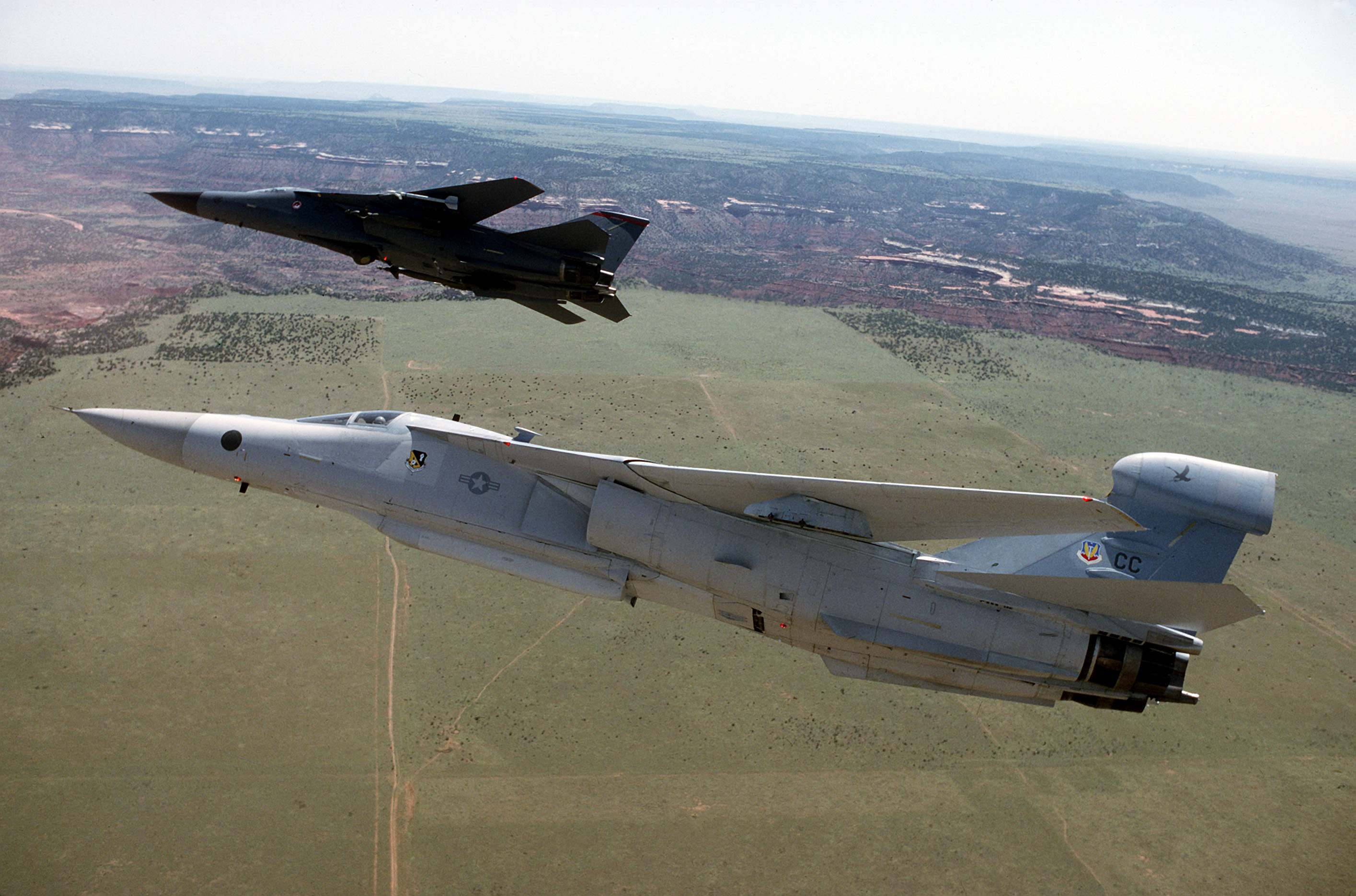 EF-111A_and_F-111F_in_flight.jpg