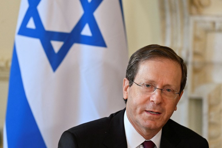 Israeli President Isaac Herzog speaks as he meets with British Prime Minister Boris Johnson (not seen) in London, Britain, November 23, 2021