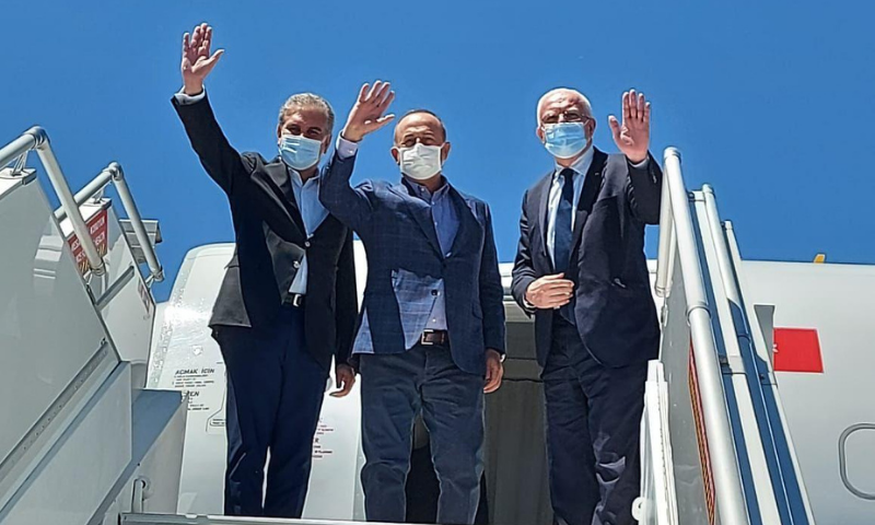 Foreign Minister Shah Mahmood Qureshi waves alongside his Turkish counterpart Mevlut Cavusoglu (centre) and Palestinian Foreign Minister Riyad Al-Maliki before leaving for New York on Wednesday. — Photo courtesy Shah Mahmood Qureshi Twitter