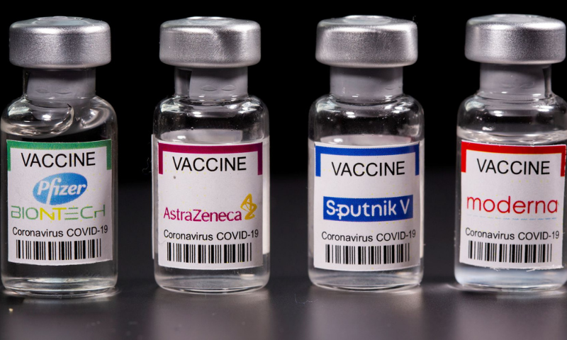 Vials with Pfizer-BioNTech, AstraZeneca, Sputnik V, and Moderna coronavirus vaccine labels are seen in this illustration. — Reuters/File