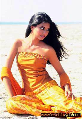 suneeta-marshal-orange-dress-beach.jpg