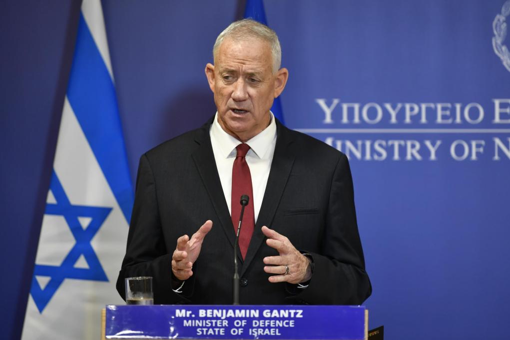 Benny Gantz, a former general, has agreed to serve in a coalition government