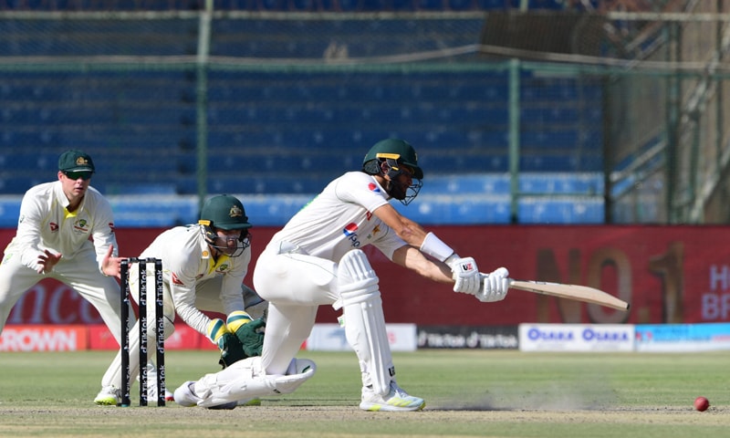 Pakistan's Shaheen Shah Afridi (R) plays a shot during the third day of the second Test cricket match between Pakistan and Australia at the National Cricket Stadium in Karachi. — AFP