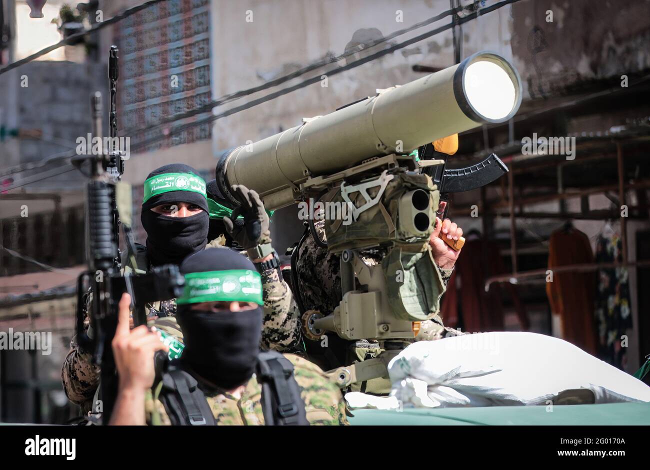 members-of-the-ezz-al-din-al-qassam-brigades-the-armed-wing-of-the-palestinian-hamas-movement-with-an-anti-tank-weapon-take-part-during-the-parade-on-the-street-in-the-northern-gaza-strip-photo-by-nidal-alwaheidi-sopa-imagessipa-usa-2G0170A.jpg