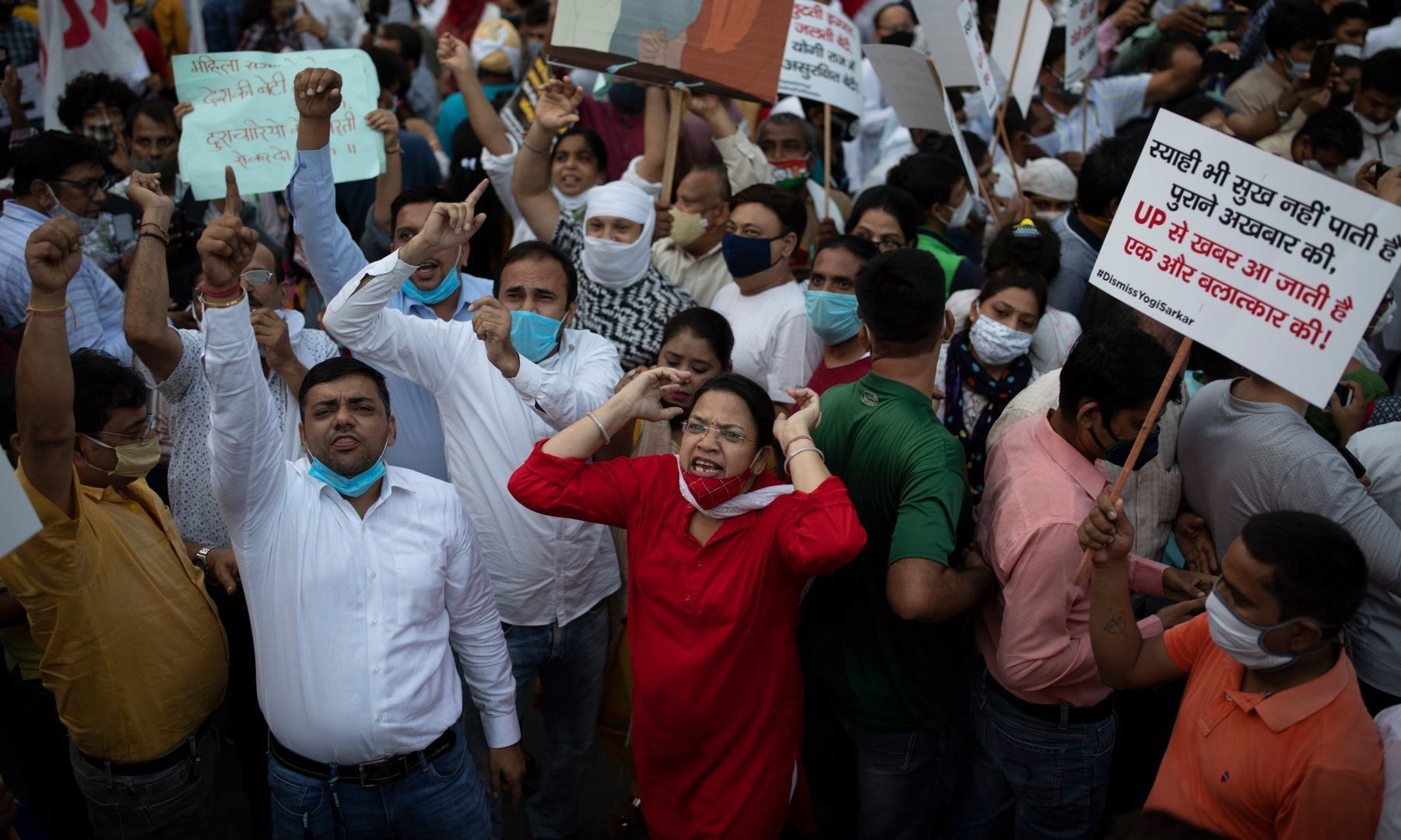 Protestors shout slogans against the gang rape and killing of a woman in India's northern state of Uttar Pradesh, in New Delhi, India, Friday. — AP