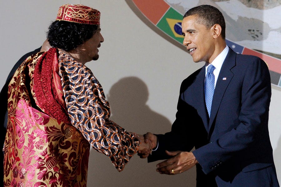 president-barack-obama-and-qaddafi-pictured-during-the-g8g5-summit-in-laquila-italy-july-9-2009.jpg