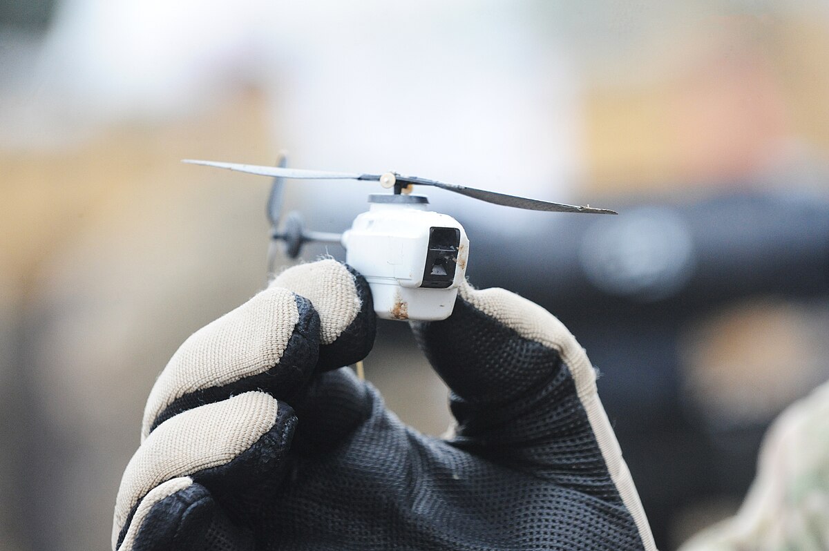 1200px-Black_Hornet_Nano_Helicopter_UAV.jpg