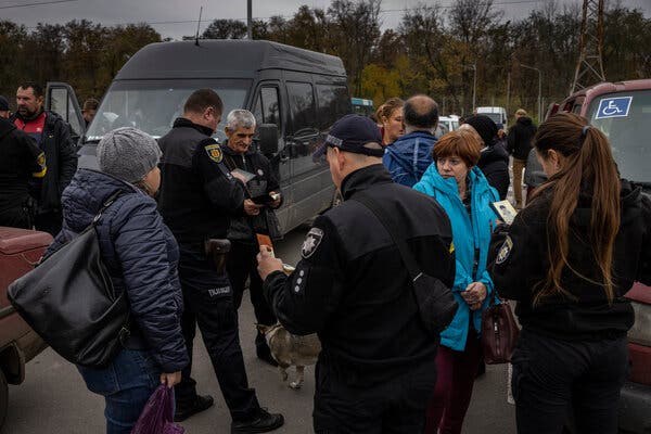 Ukrainian citizens who had fled Russia-occupied territories in southern Ukraine reached a filtration point this month in Zaporizhzia, in southeastern Ukraine.