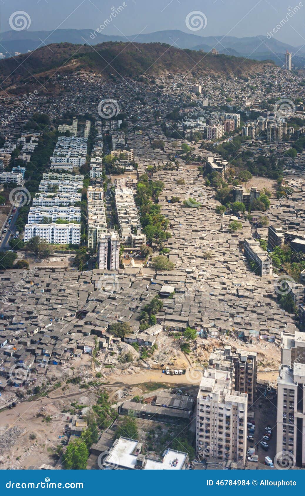 aerial-view-mumbai-slums-seen-air-fill-every-gap-larger-residential-buildings-offices-46784984.jpg