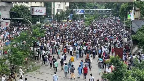 Protesters gather in Dhaka's Shahbagh area on Sunday