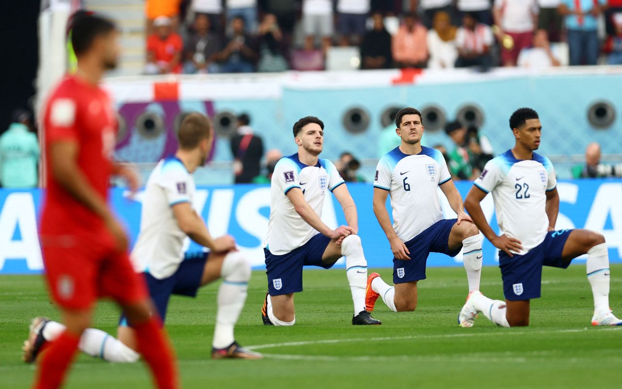 England players take a knee before the start of the Iran match. England manager Gareth Southgate confirmed Sunday that the team would be making the symbolic gesture. We think it's a strong statement that will go around the world for young people in particular to see that inclusivity is very important, Southgate said.