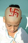 100px-Swastik_on_head.jpg