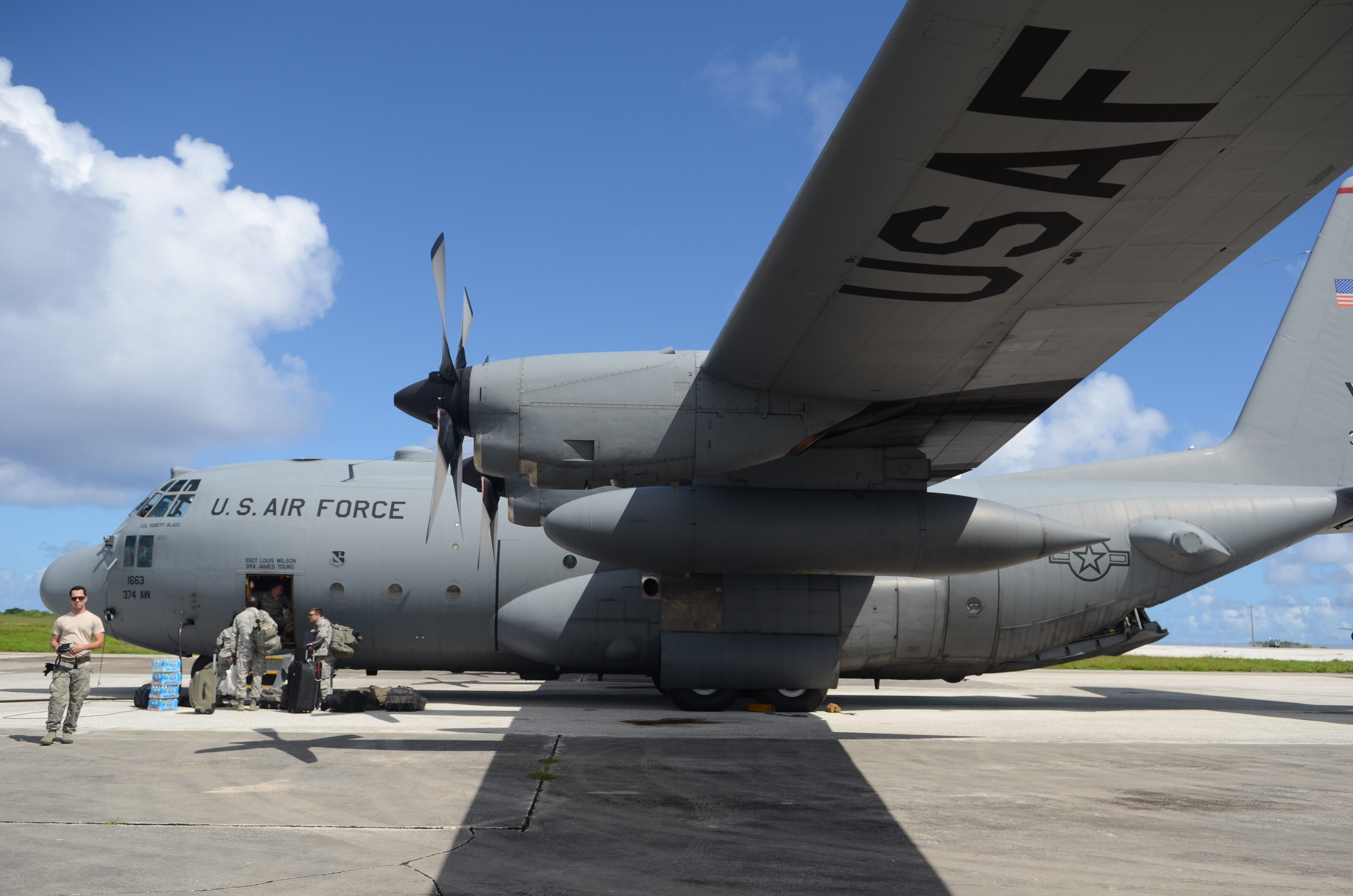 U.S._Airmen_with_the_36th_Contingency_Response_Group_board_a_C-130_Hercules_aircraft_at_Andersen_Air_Force_Base,_Guam,_before_departing_for_a_mission_in_support_of_Operation_Damayan_in_Tacloban,_Philippines_131114-F-NA975-297.jpg