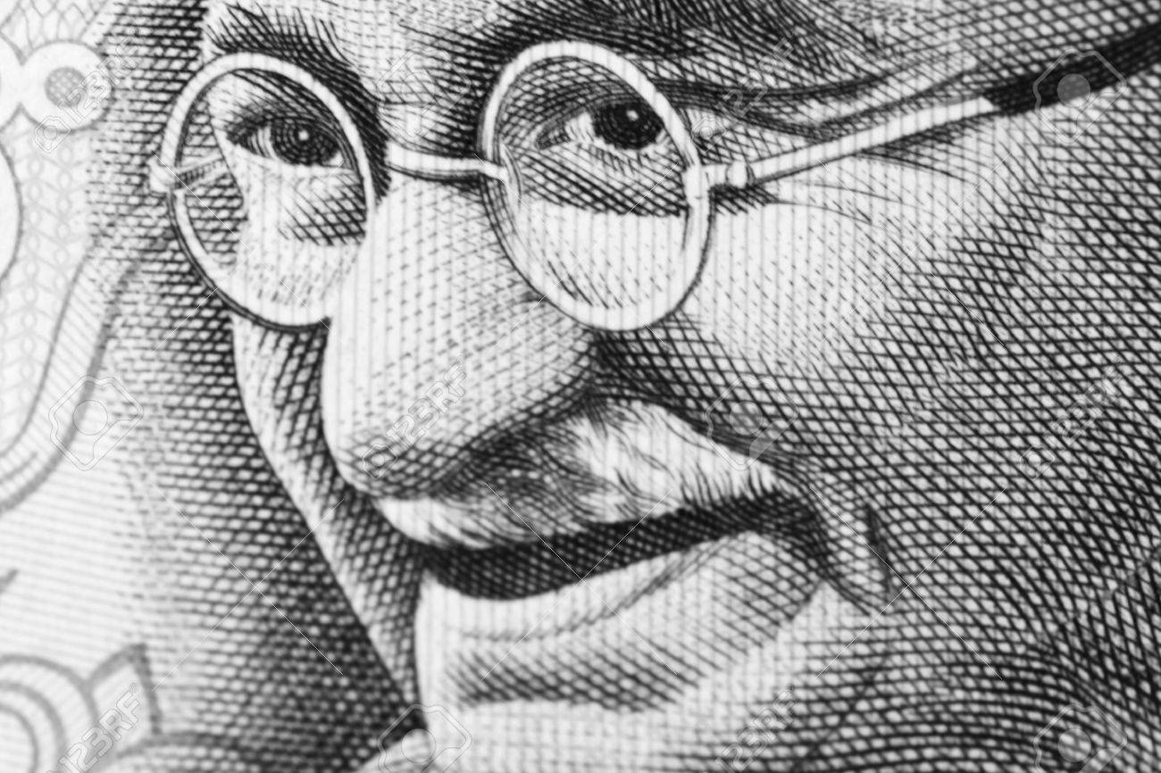 11311569-close-up-shot-of-gandhi-on-rupee-note.jpg