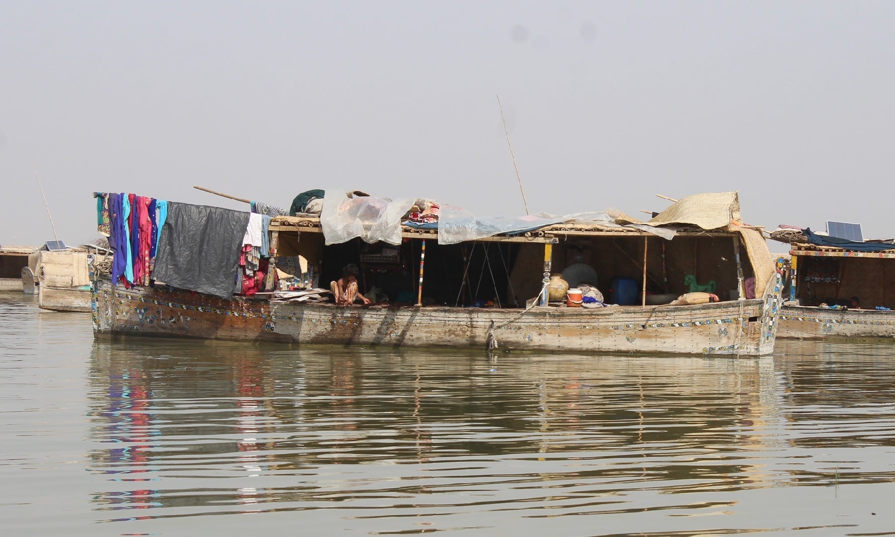 The village built on boats; Abu Bakr Sheikh