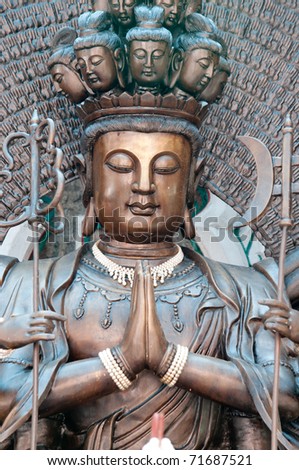 stock-photo-guan-yin-buddha-statue-in-chinese-thailand-temple-71687521.jpg