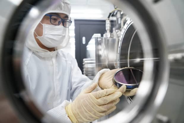 A researcher in a semiconductor lab in Beijing, May 26, 2020. Intel, the leading U.S. semiconductor chip maker, has invested in Chinese chip startups.