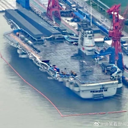 The cover on a runway on the Fujian has been removed, signalling catapult launch tests could be in the offing. Photo: Weibo