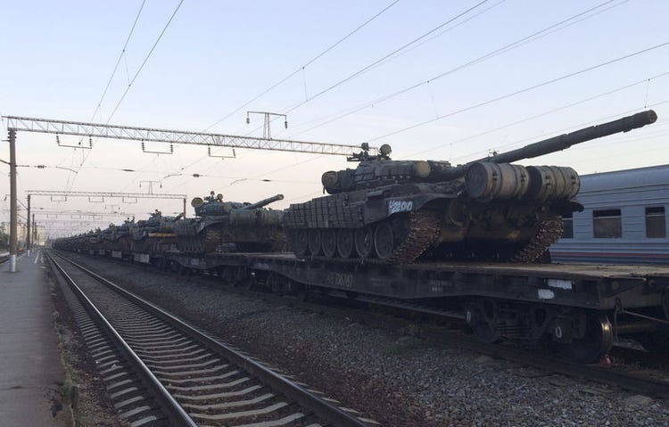 Tanks are seen on a freight train shortly after its arrival at a railway station in the Russian southern town of Matveev Kurgan, near the Russian-Ukrainian border in Rostov region, Russia, May 26, 2015. Picture taken with a mobile phone. REUTERS/Maria Tsvetkova